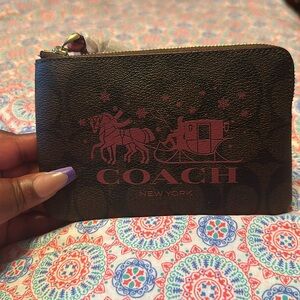 Brand new Coach wristlet